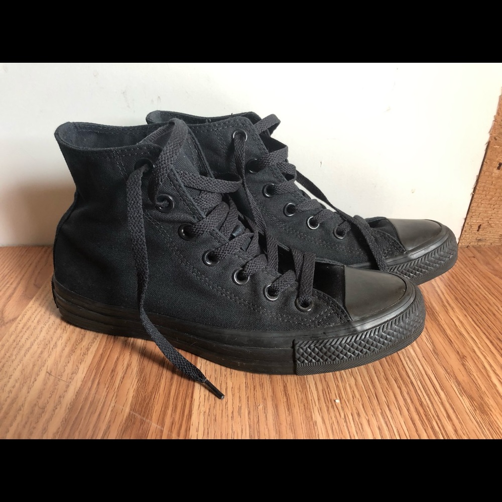 High top black Converse sneakers